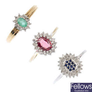 Three 9ct gold gem-set and diamond cluster rings.