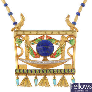 An Egyptianesque enamel and gem-set necklace.