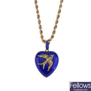 A late Victorian gold enamel and diamond pendant.
