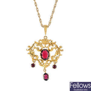 A 1970s 9ct gold garnet pendant, with chain.