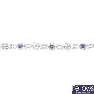 A 15ct gold and platinum sapphire and diamond bracelet.