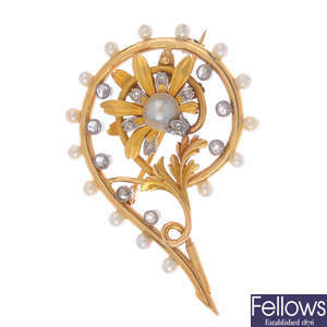 A late Victorian gold blister pearl and diamond brooch.