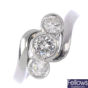 A platinum diamond three-stone ring. 