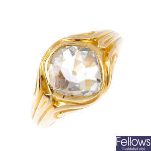A late Victorian gold diamond single-stone ring.