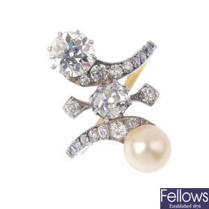 An early 20th century diamond and cultured pearl ring.