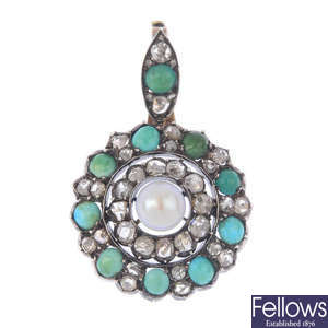 A turquoise and diamond pendant.