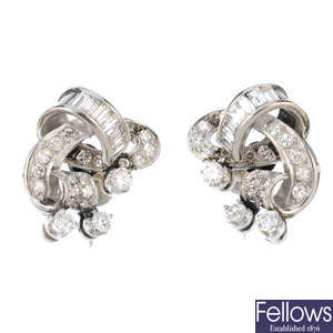 A pair of mid 20th century diamond earrings.