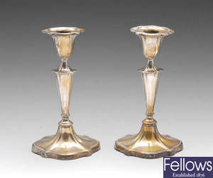 A pair of Victorian silver mounted candlesticks, etc.