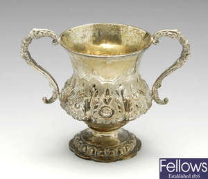 A William IV silver twin-handled cup & George III cream jug.
