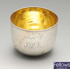 A George III silver tumbler cup of plain raised form.