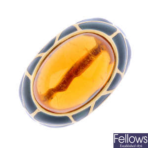 A citrine and enamel dress ring.