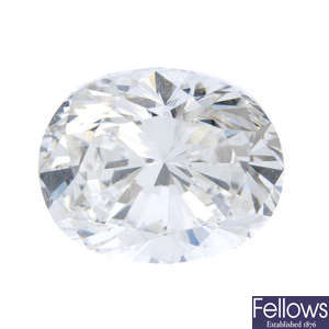 An oval modified brilliant-cut diamond, weighing 3.01cts.