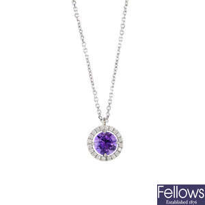 An amethyst and diamond pendant, with chain.