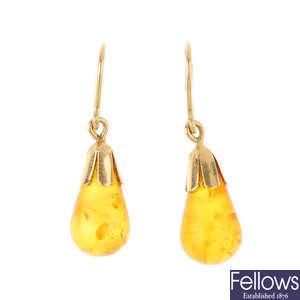 A pair of of 14ct gold reconstituted amber earrings.