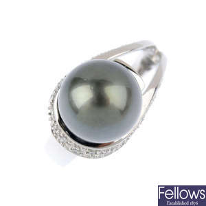 A 9ct gold cultured pearl and diamond dress ring and cultured pearl earrings.