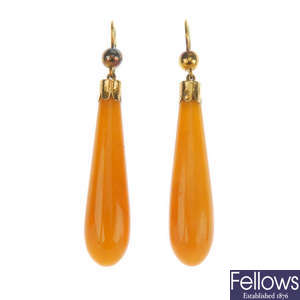 A pair of natural amber earrings.