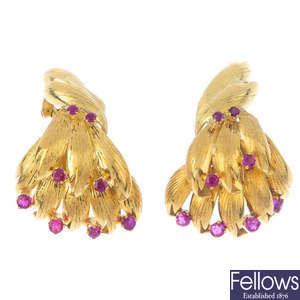 A pair of ruby earrings.