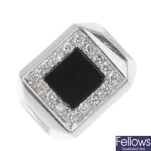 A gentleman's 1970s 14ct gold diamond and onyx signet ring.