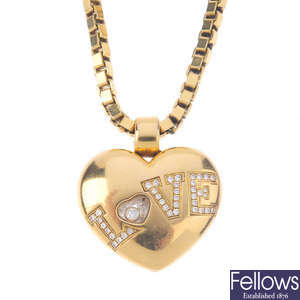 CHOPARD - an 18ct gold 'Happy Diamonds' Love pendant, with chain.