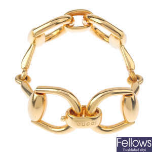 GUCCI -  an 18ct gold 'Horsebit' bracelet.