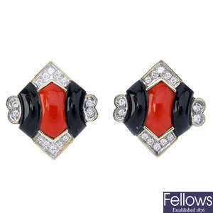 A pair of coral, onyx and diamond earrings.