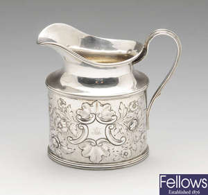 A late Victorian large silver cream jug.