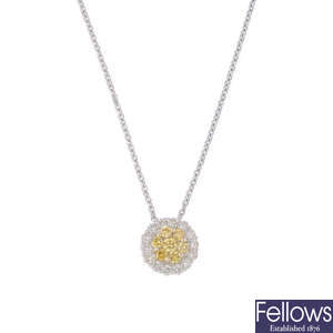 An 18ct gold colour treated 'yellow' diamond and diamond cluster pendant, with chain.