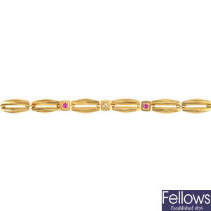 An 18ct gold diamond and ruby bracelet.