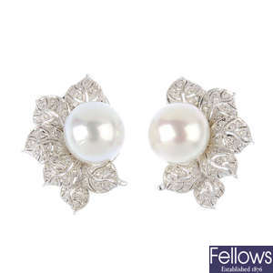 A pair of South Sea cultured pearl and diamond foliate earrings.