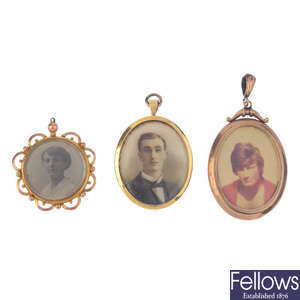 Three late 19th to early 20th century gold photograph pendants.