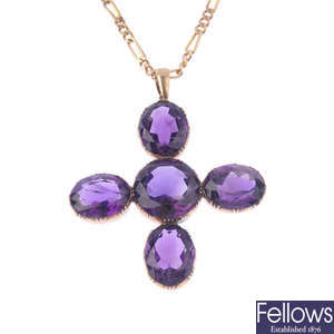 An amethyst cross pendant, with 9ct gold figaro-link chain.