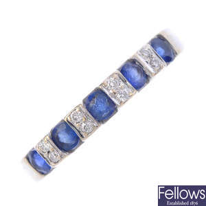 An 18ct gold diamond and sapphire half-circle eternity ring.