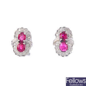 A pair of spinel and diamond earrings.