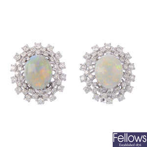 A pair of 18ct gold diamond and opal earrings.