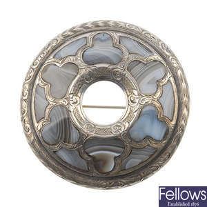 A late 19th century silver and blue lace agate brooch. 