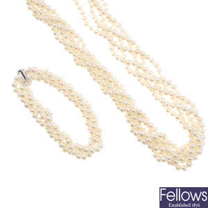 A cultured pearl necklace and five matching cultured pearl bracelets.