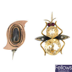 A mid Victorian memorial brooch and an early 20th century brooch.