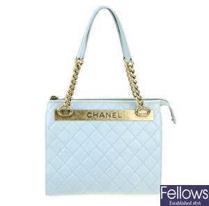 CHANEL - a quilted leather handbag.
