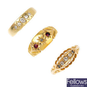 Three early 20th century 18ct gold diamond and gem-set rings.