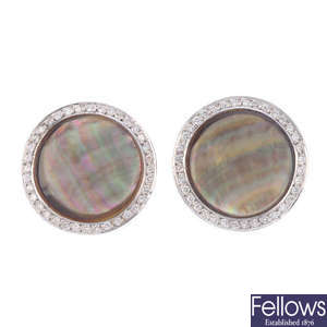 A pair of abalone shell and diamond earrings.