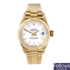 ROLEX - a lady's 18ct gold Datejust bracelet watch.
