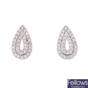 A pair of 18ct gold diamond earrings.