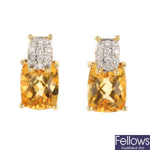 A pair of 18ct gold citrine and diamond earrings.
