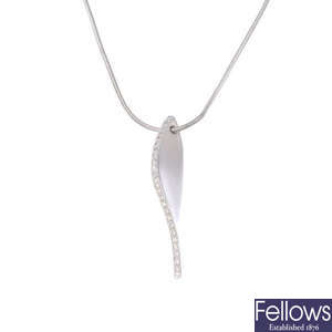 An 18ct gold diamond pendant, with chain,