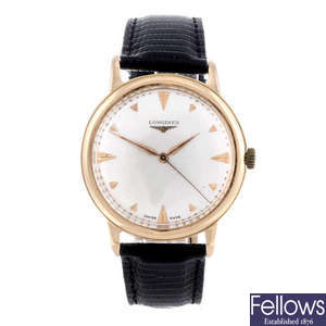LONGINES - a gentleman's rose metal wrist watch.