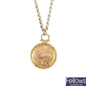 An early 20th century 9ct gold front and back locket and gold plated chain.