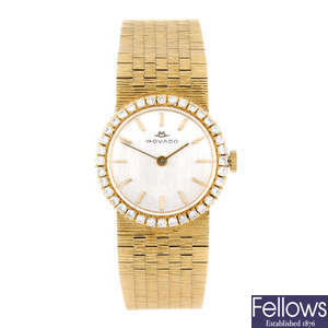 MOVADO - a lady's yellow metal bracelet watch.