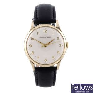 IWC - a gentleman's 9ct yellow gold wrist watch.