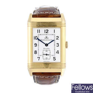JAEGER-LECOULTRE - a gentleman's 18ct yellow gold Reverso wrist watch.