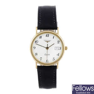 LONGINES - a lady's 18ct yellow gold wrist watch.